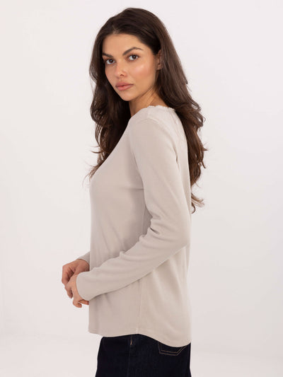 Beżowa bluzka longsleeve z naszywką na plecach