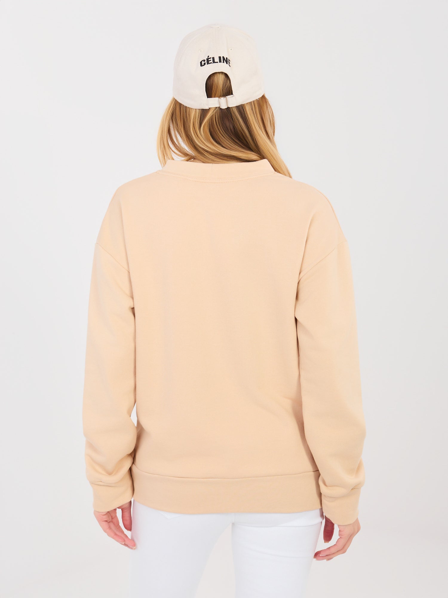 Beżowa bluza oversize z ozdobną naszywką