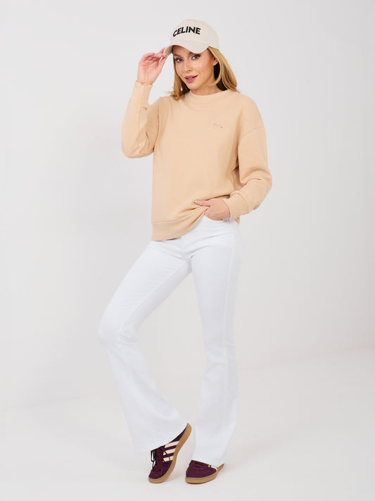 Beżowa bluza oversize z ozdobną naszywką