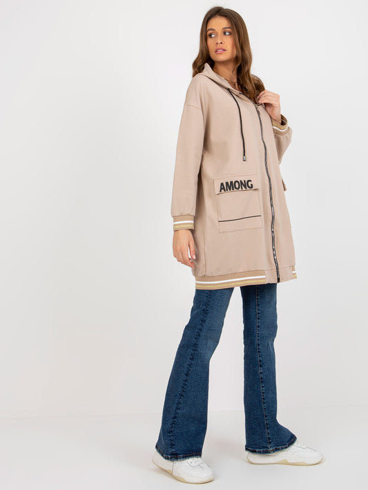 Beżowa długa bluza rozpinana o kroju oversize