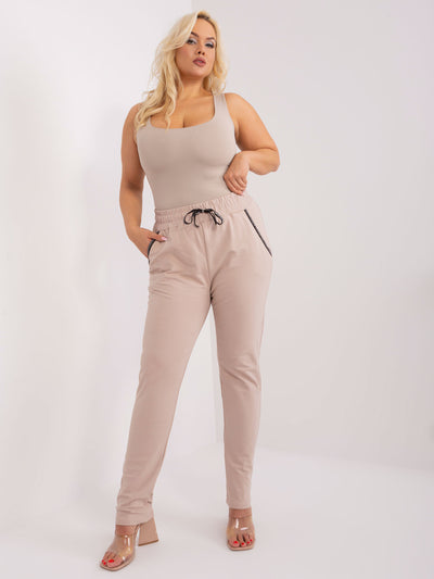 Beżowe dresowe spodnie plus size z troczkami Savage