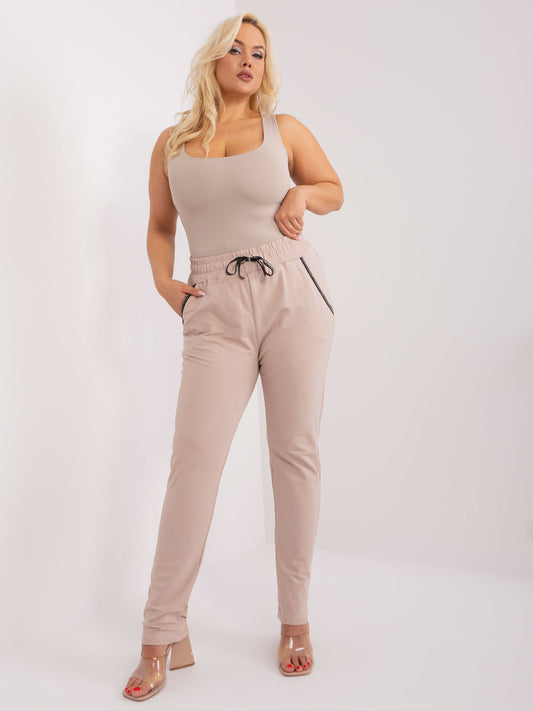 Beżowe dresowe spodnie plus size z troczkami Savage