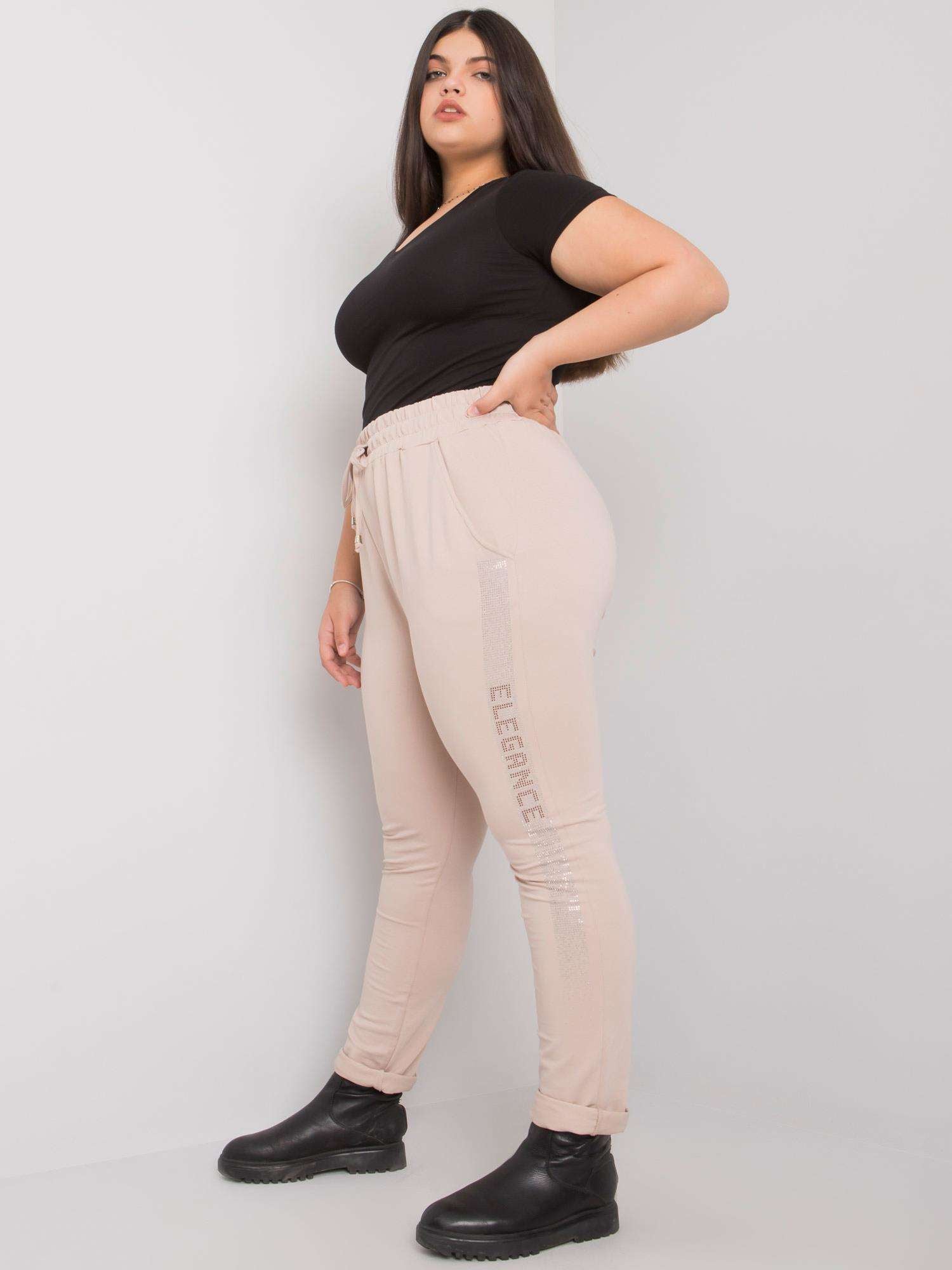 Beżowe spodnie dresowe plus size z dżetami