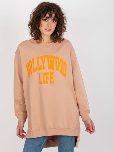 Beżowo-pomarańczowa długa bluza oversize z napisem