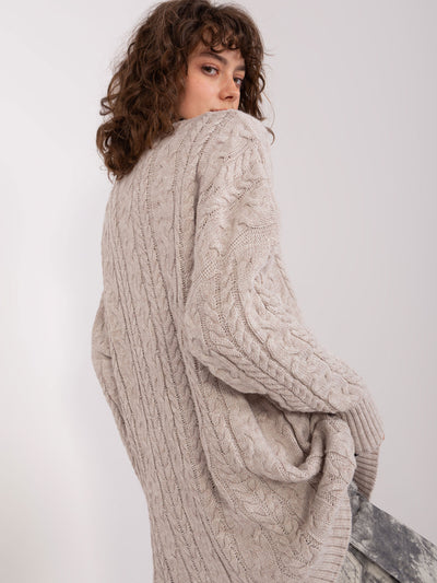 Beżowy damski sweter w warkoczowe sploty