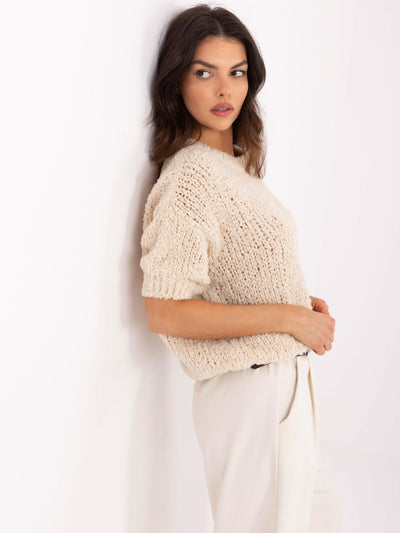 Beżowy sweter oversize z krótkim rękawem