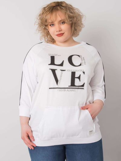 Biała bluzka plus size z kieszenią i aplikacjami