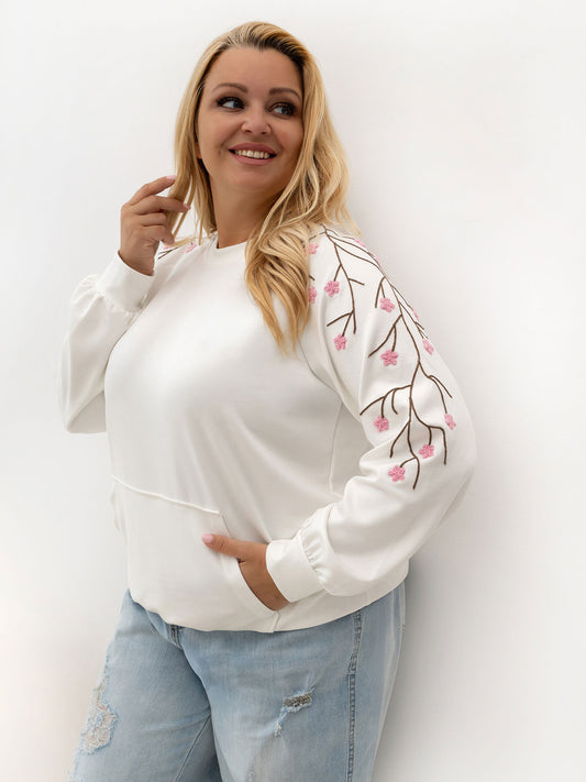 Biała damska bluza plus size z haftem na rękawach
