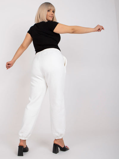 Białe dresowe spodnie plus size