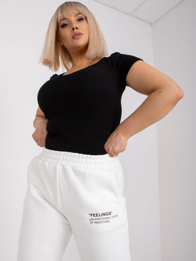 Białe dresowe spodnie plus size