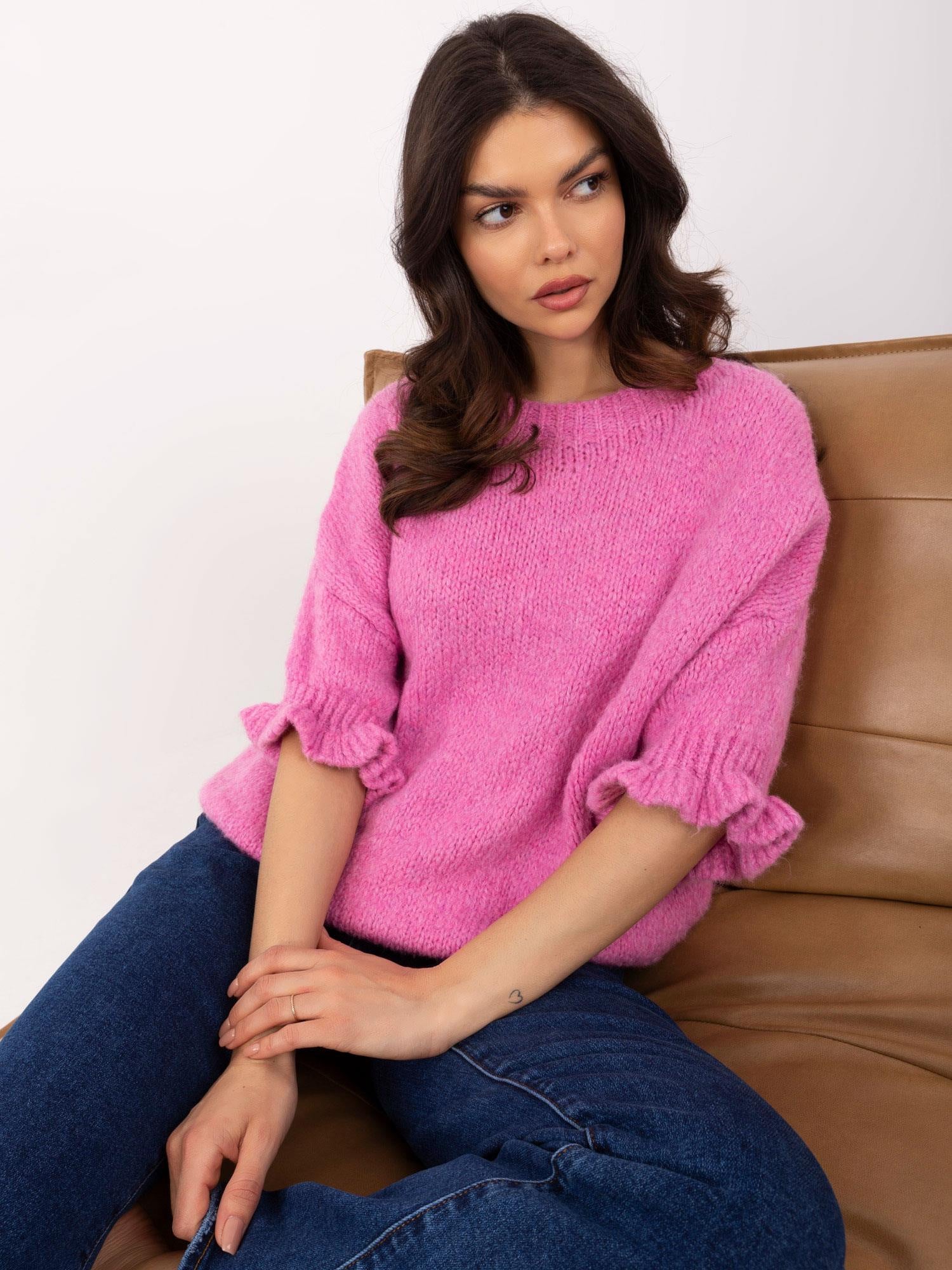 Brudnoróżowy sweter oversize w jednolitym kolorze