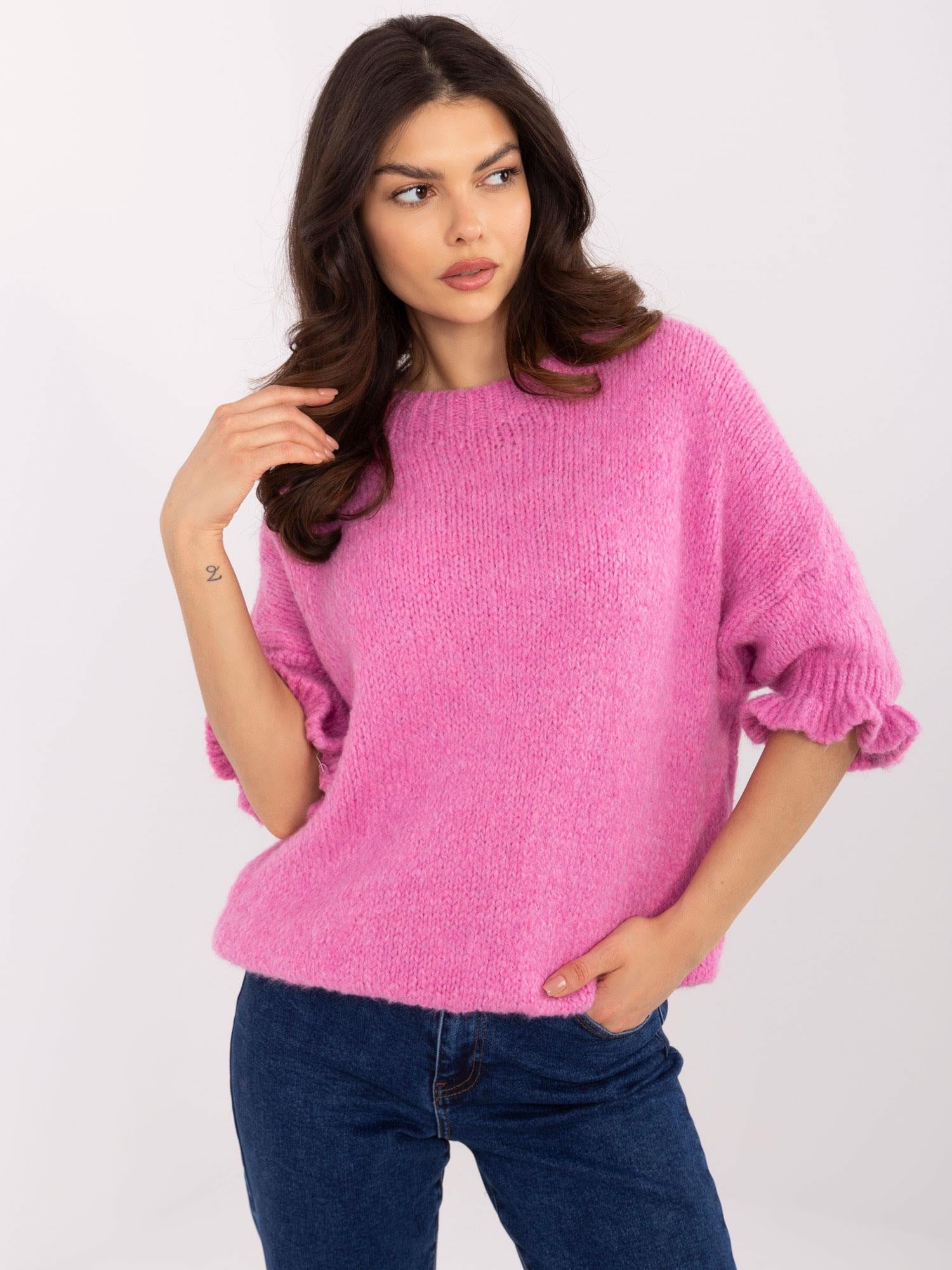 Brudnoróżowy sweter oversize w jednolitym kolorze
