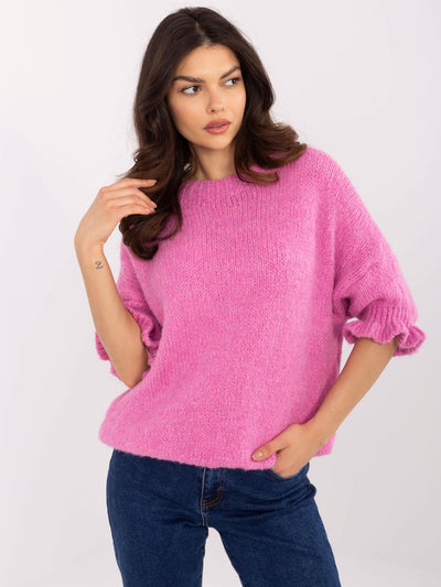 Brudnoróżowy sweter oversize w jednolitym kolorze