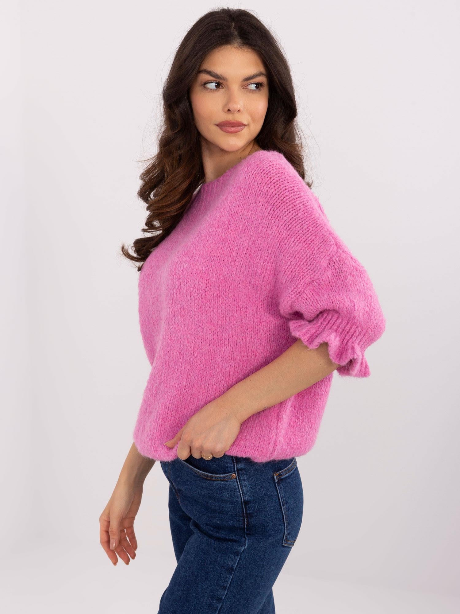 Brudnoróżowy sweter oversize w jednolitym kolorze