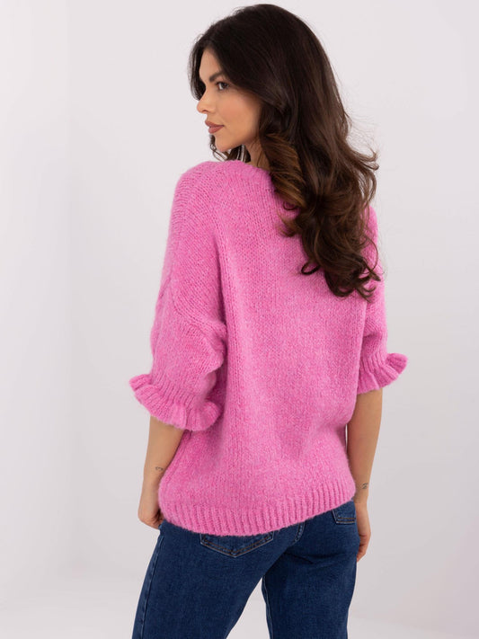 Brudnoróżowy sweter oversize w jednolitym kolorze