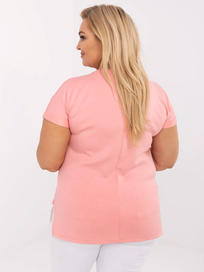 Brzoskwiniowa bluzka plus size z białą wstawką