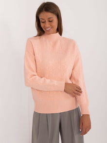 Brzoskwiniowy wzorzysty sweter z półgolfem