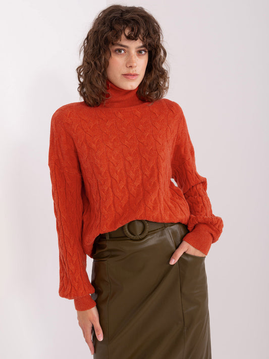 Pomarańczowy sweter golf z warkoczami