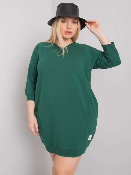 Ciemnozielona sukienka plus size z kieszeniami