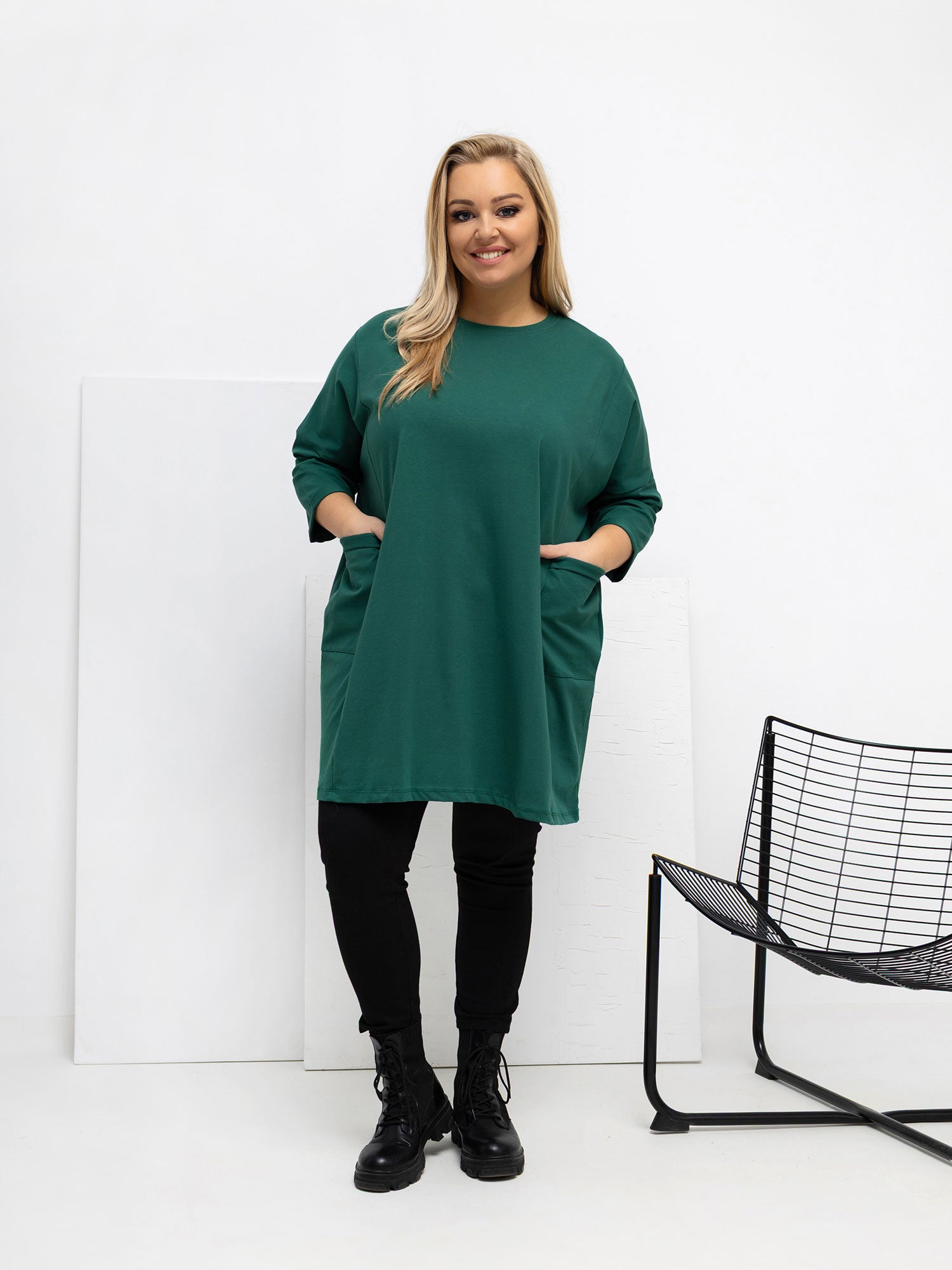 Ciemnozielona bluzka plus size z kieszeniami