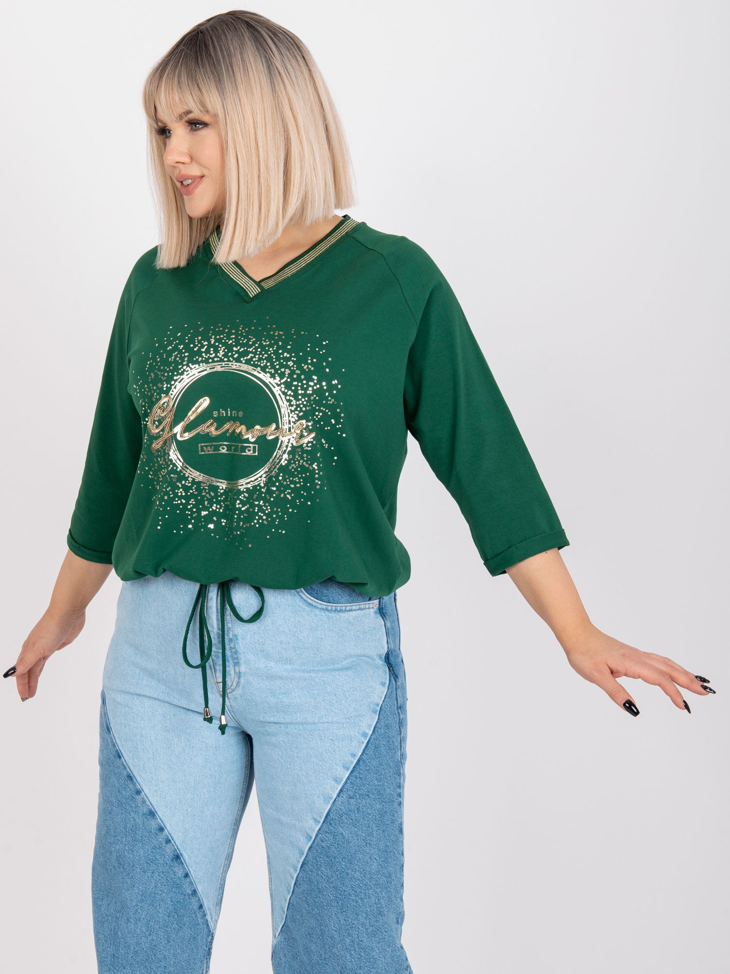 Ciemnozielona bluzka plus size z aplikacją