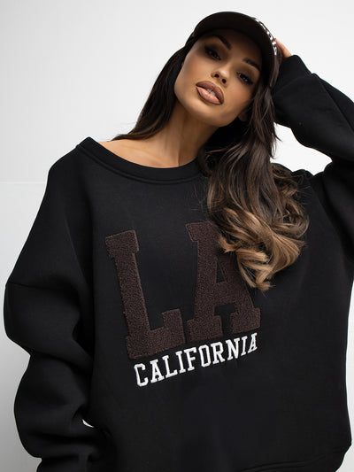 RUE PARIS Czarna damska bluza oversize z naszywką