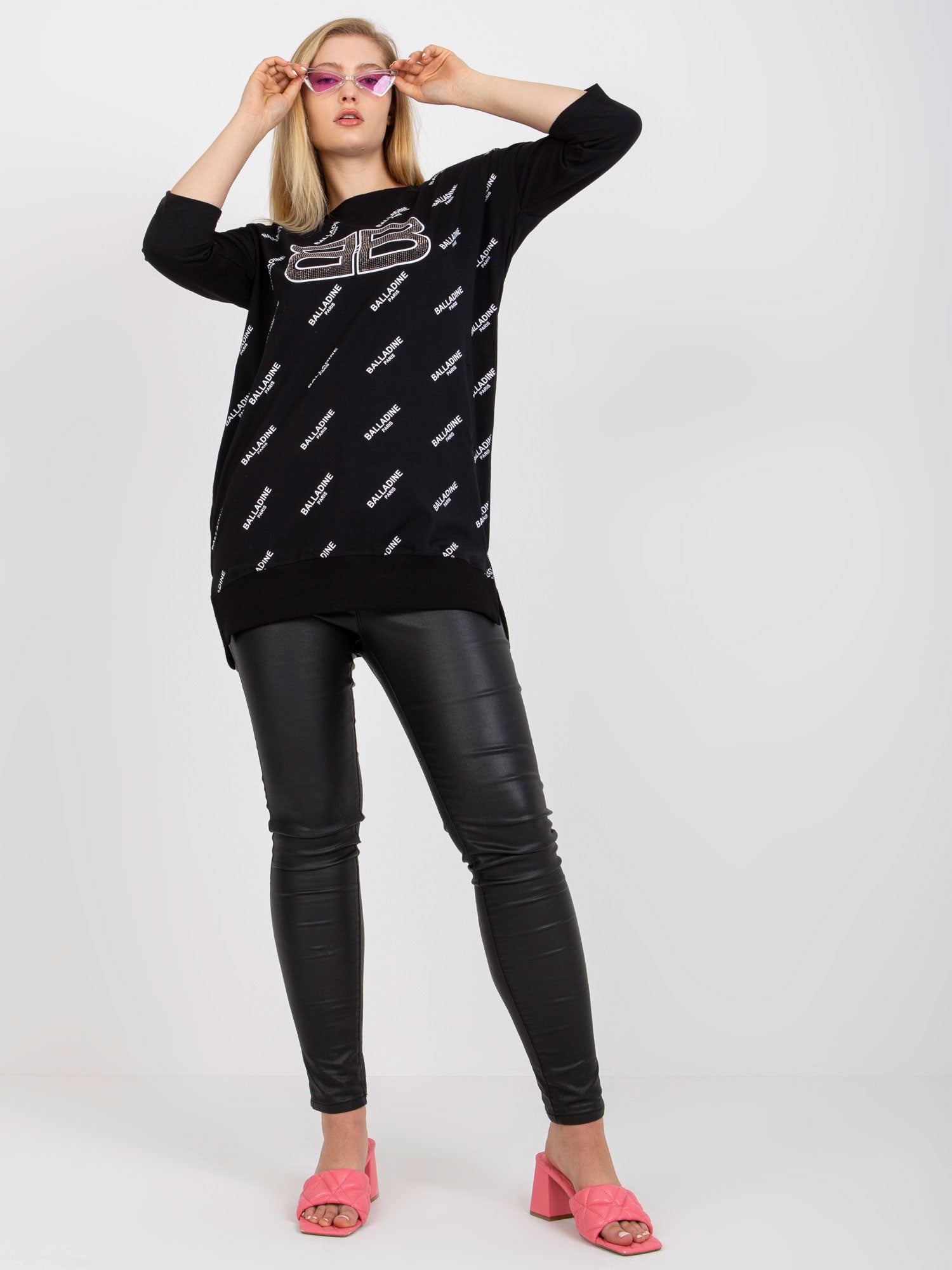 Czarna długa bluzka plus size z kieszeniami