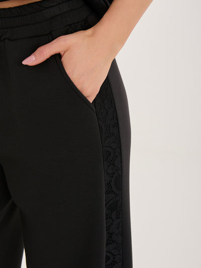 Czarne dresowe spodnie wide leg od kompletu