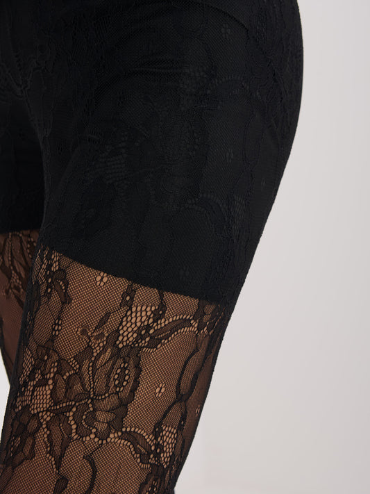 Czarne eleganckie legginsy z koronki