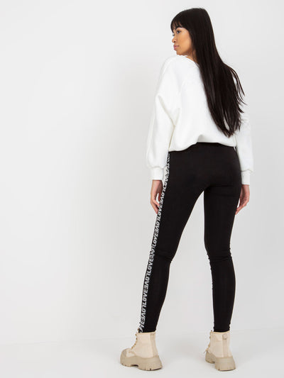 Czarne damskie legginsy casualowe z lampasami