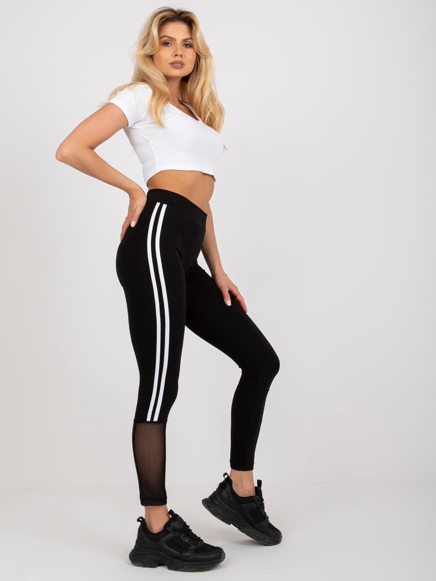 Czarne legginsy sportowe z lampasami