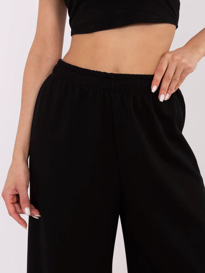 Czarne damskie spodnie basic z szeroką nogawką