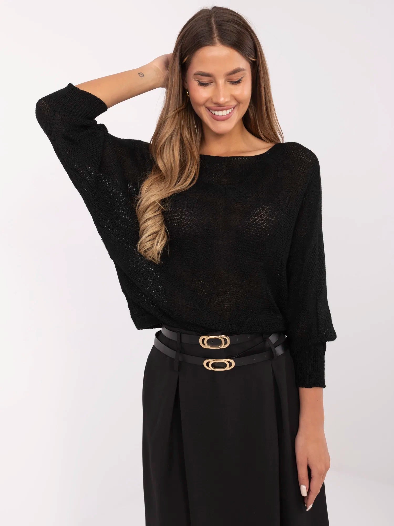 Czarny sweter oversize z kokardą na plecach