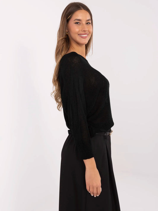 Czarny sweter oversize z kokardą na plecach