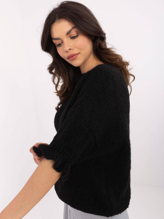 Czarny damski sweter oversize ze ściągaczami