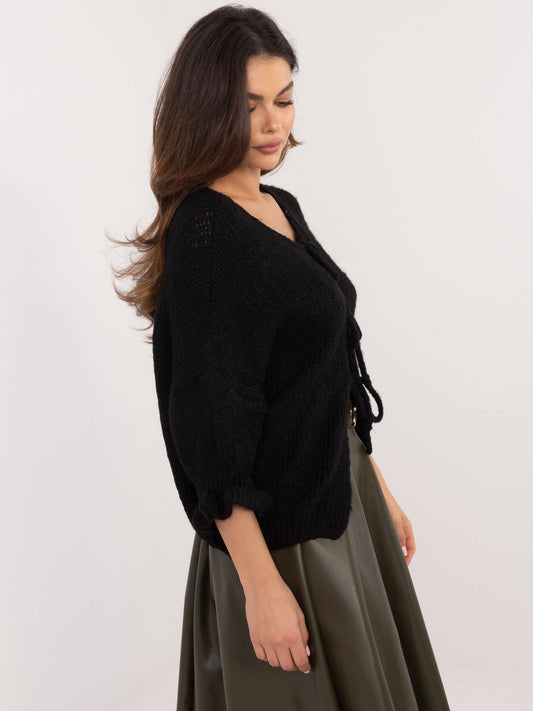 Czarny sweter oversize z wiązaniem z przodu