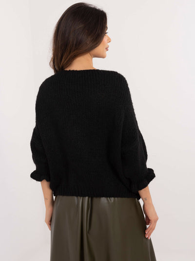 Czarny sweter oversize z wiązaniem z przodu