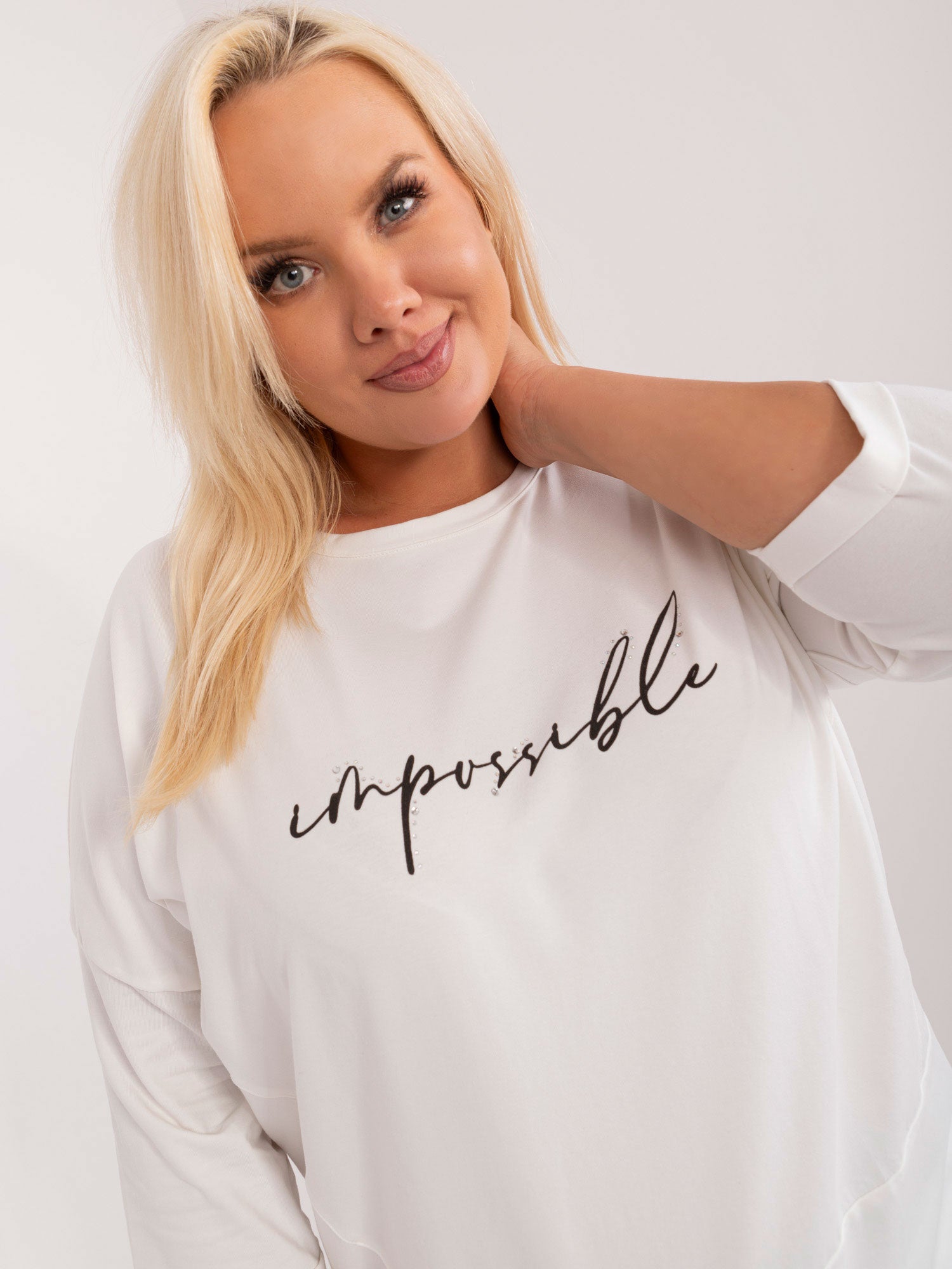 Ecru casualowa bluzka plus size z aplikacją