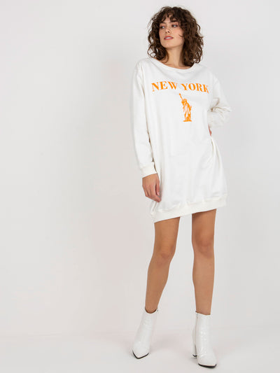 Ecru-pomarańczowa długa bluza oversize z nadrukiem