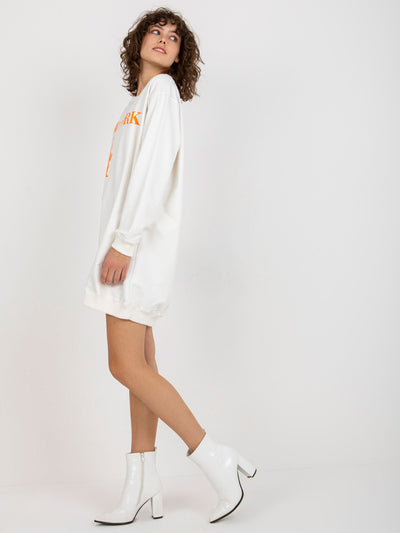 Ecru-pomarańczowa długa bluza oversize z nadrukiem