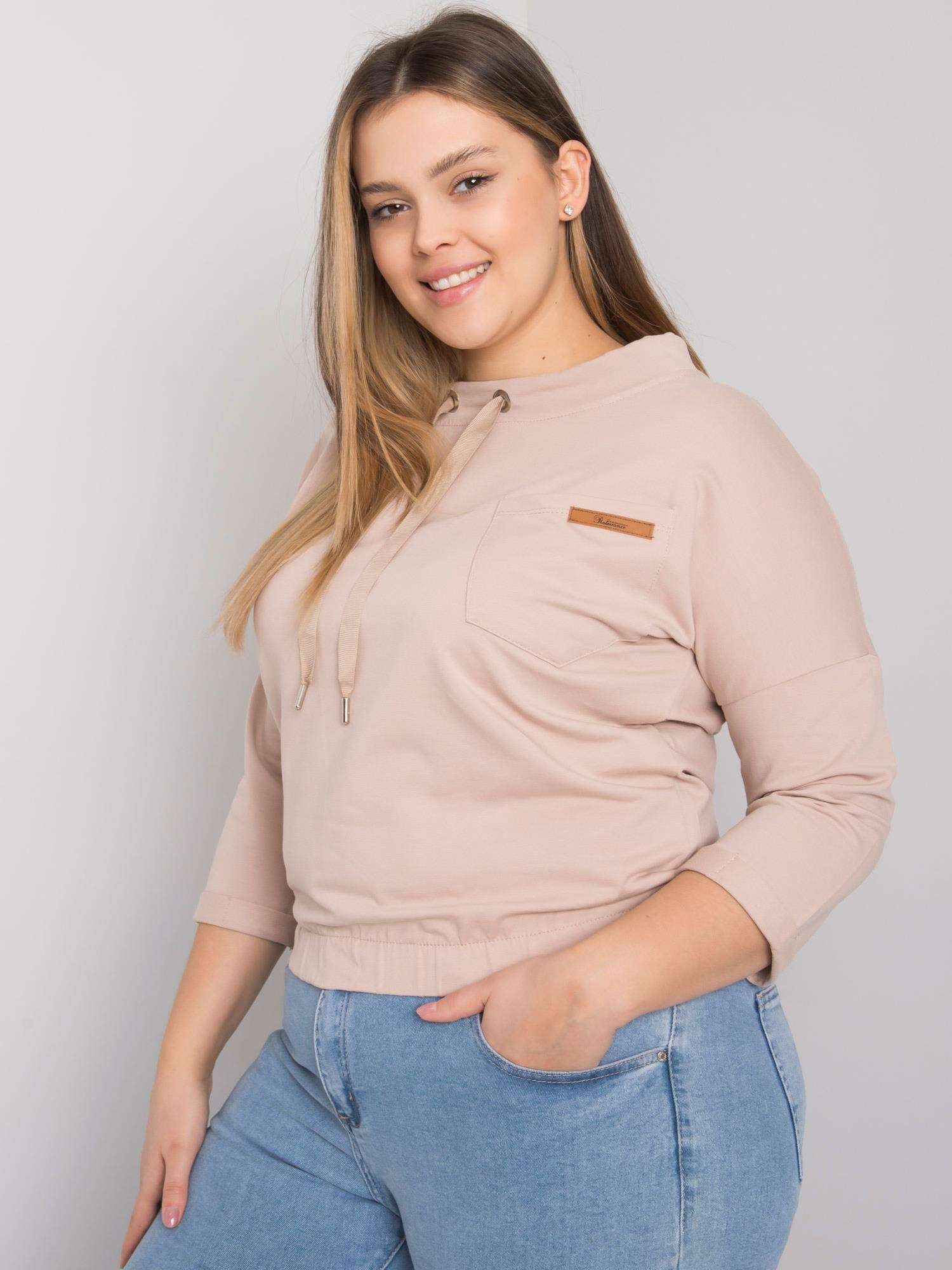 Jasnobeżowa bluza plus size z kieszenią