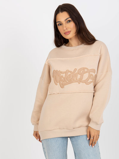 Jasnobeżowa dresowa bluza bez kaptura z naszywkami