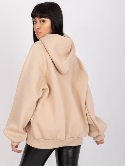 Jasnobeżowa dresowa bluza z kapturem o kroju oversize