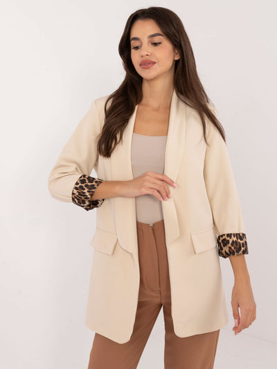 Jasnobeżowa damska marynarka bez zapięcia