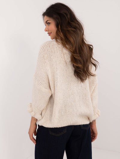 Jasnobeżowy sweter o kroju oversize z rękawem 3/4