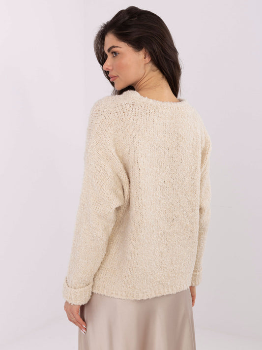 Jasnobeżowy sweter boucle z domieszką alpaki
