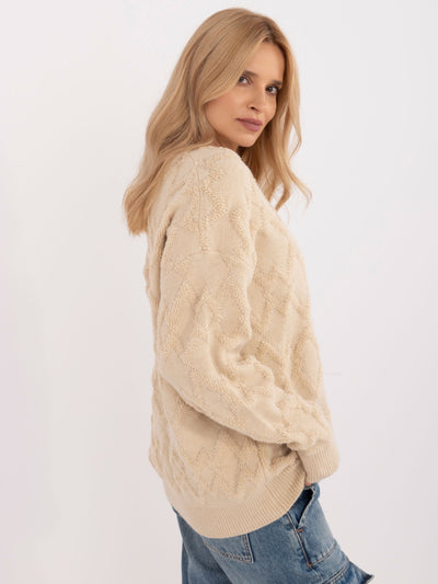 Jasnobeżowy sweter oversize z długim rękawem