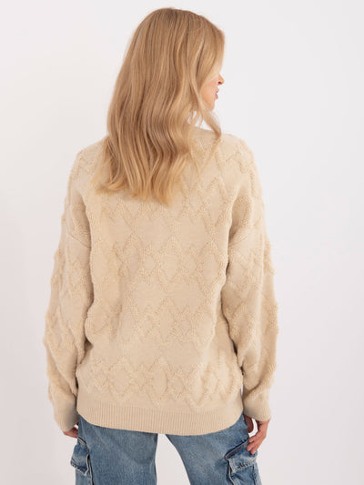 Jasnobeżowy sweter oversize z długim rękawem