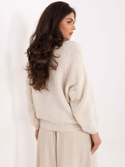 Jasnobeżowy sweter oversize z domieszką wełny