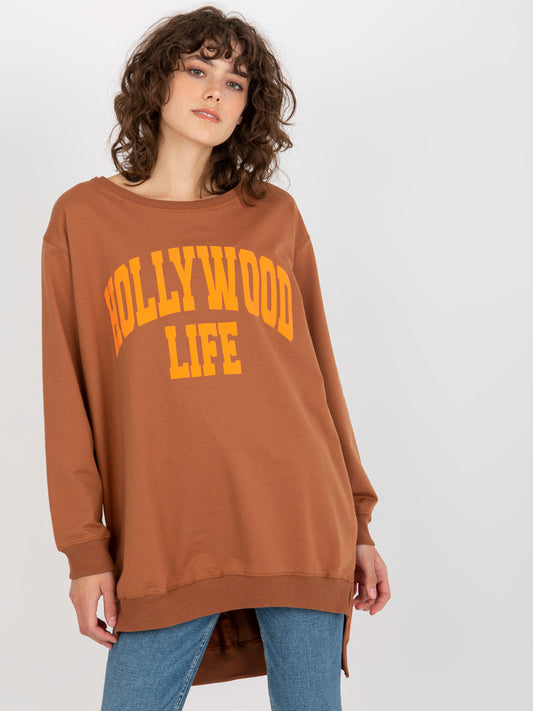 Jasnobrązowo-pomarańczowa długa bluza oversize z napisem